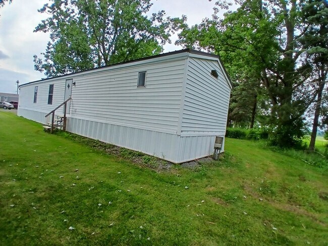 Building Photo - Pine Village Estates MHP