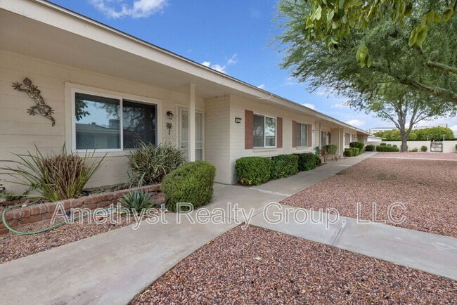 Building Photo - 10547 W Coggins Dr
