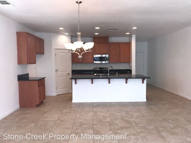 Building Photo - 4 br, 2 bath House - 12345 Canyonlands Dr.
