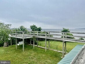 Building Photo - 8205 Bayside Dr