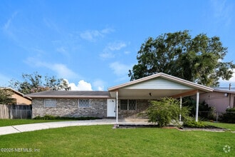 Building Photo - 10962 Luana Dr N