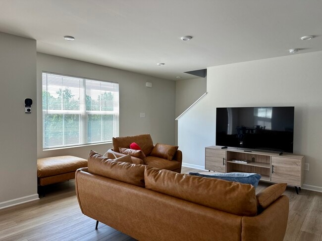 New leather sofas and 65’ Samsung TV - 149 Thicket Dr Townhome