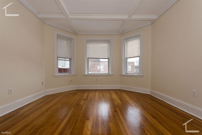 Building Photo - 4 br, 2 bath Condo - 150 Amory St 1