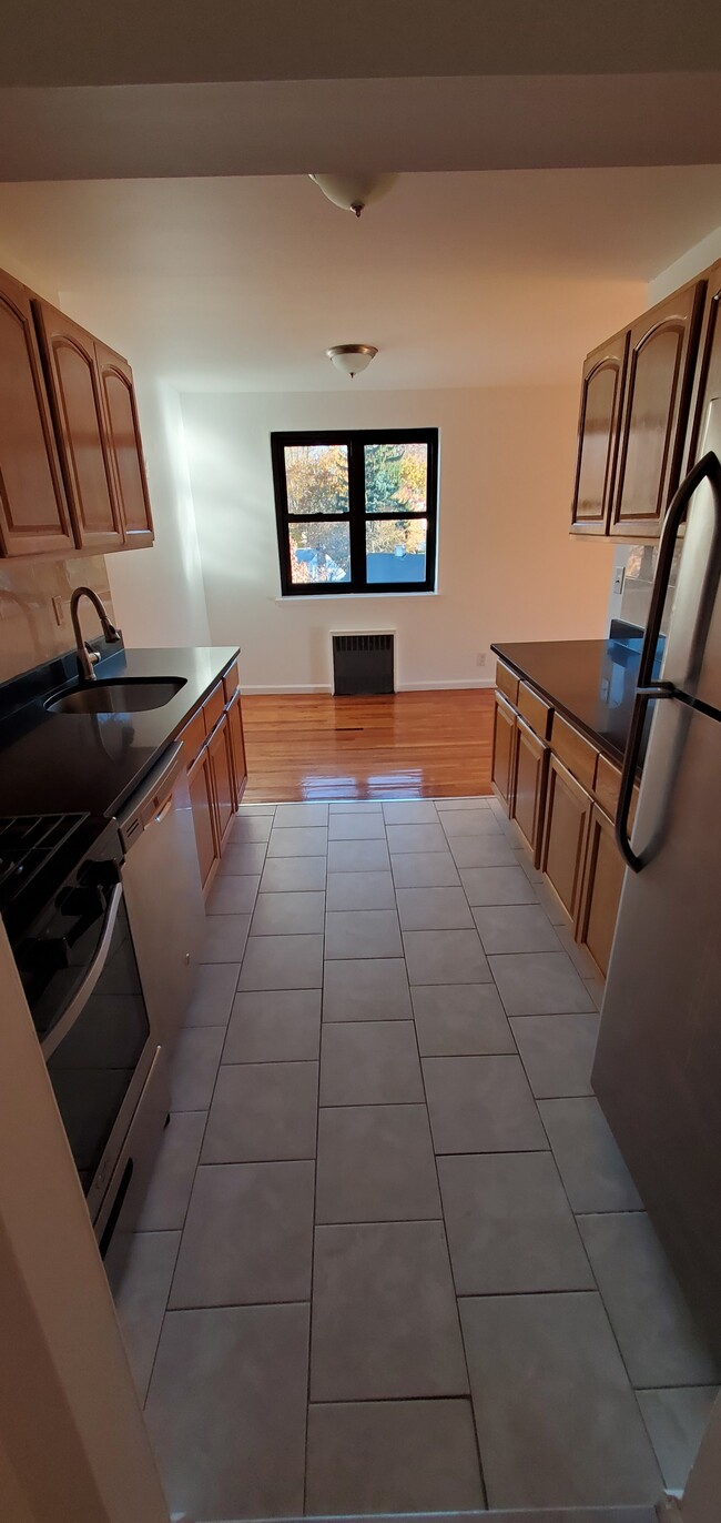 newly renovated kitchen with stainless steel appliances - 110 Fisher Ave