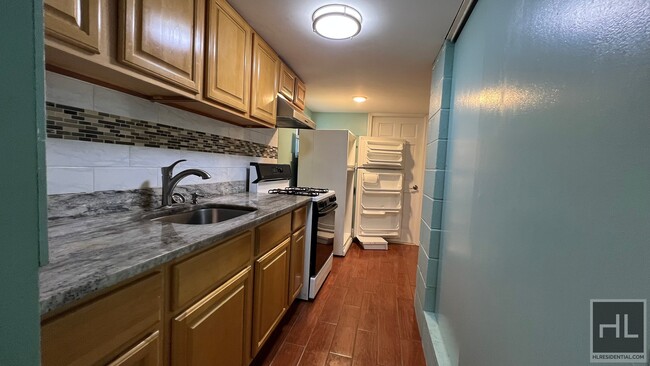 Building Photo - BEAUTIFULLY GUT RENOVATED 1 BEDROOM  IN BA...