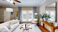 Located at 9400 Havenbrooke Way in Knoxville, Tennessee, this two-story, 2-bedroom, 3-bathroom home is thoughtfully laid out across two equally sized floors. The main level welcomes you into a bright living room adorned with crown molding, hardwood flooring, a ceiling fan, and elegant French doors that fill the space with natural light. Adjacent to the living room, the dining area features hardwood floors, crown molding, a stylish pendant chandelier, and a natural wood live-edge dining table, creating a warm and inviting atmosphere. The kitchen is well-equipped with rich dark granite countertops, light maple cabinetry, tile flooring, a built-in dishwasher, and a double sink — combining functionality with a classic aesthetic. Upstairs, both bedrooms offer plush carpeting and a comfortable, restful ambiance. The generously sized primary bedroom provides direct access to an en-suite bathroom. The second bedroom benefits from natural light through a large window. Three bathrooms throughout the home each feature tub-shower combinations with chrome fixtures and tile flooring. Additional highlights include two closets, a hallway, and a staircase connecting both floors, making this a well-organized and efficient home.