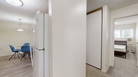 Located at 245 Stillwater Dr in Saskatoon, Saskatchewan, this three-bedroom, one-bathroom single-floor home offers a well-organized and functional layout finished in warm, neutral tones throughout. The open living and dining area serves as the heart of the home, featuring soft carpet underfoot, a textured ceiling, and a window with a balcony door that brings in natural light and outdoor views of surrounding greenery. The space flows seamlessly from the living area into the dining zone, providing comfortable room for both relaxing and entertaining. The kitchen is efficiently designed and connects directly to the main living space. Each of the three bedrooms is carpeted and features windows that offer natural light and views of the tree-lined exterior. The primary bedroom includes a closet with a hanging rod for ample storage. The full bathroom is finished with wood-look flooring, white tilework surrounding the tub-shower combination, a white vanity with a mirror, and clean, bright fixtures throughout. A dedicated in-suite laundry area accommodates a full-size washer and dryer, adding everyday convenience. A central hallway connects the bedrooms and bathroom, completing this practical and comfortable home.