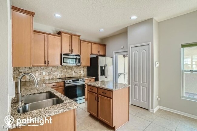 Building Photo - 3 br, 2.5 bath House - 502 Rainbow Springs...