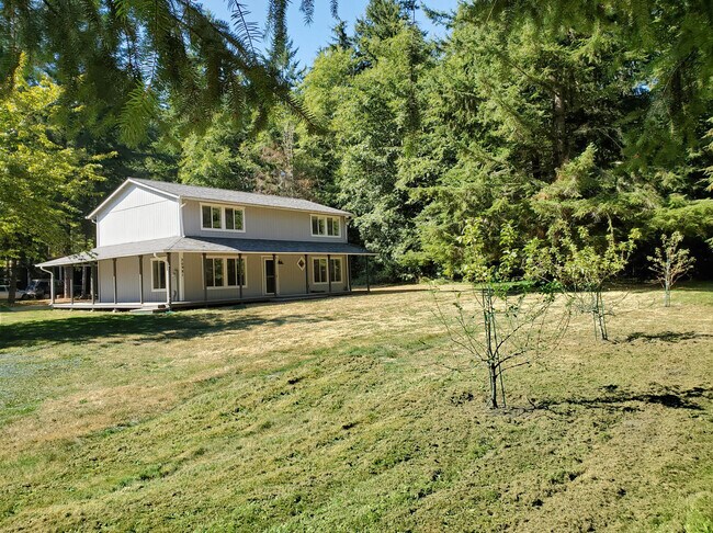 home from front yard with fruit trees - 20981 Port Gamble Rd NE