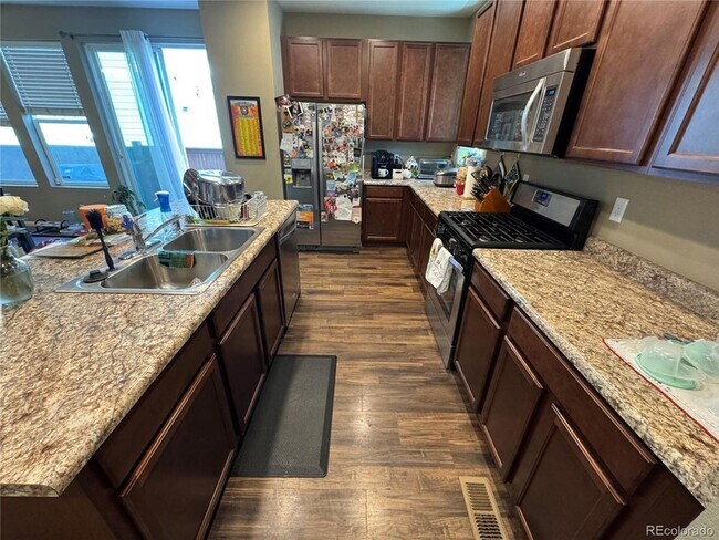 Photo - 8087 E 53rd Dr Townhome