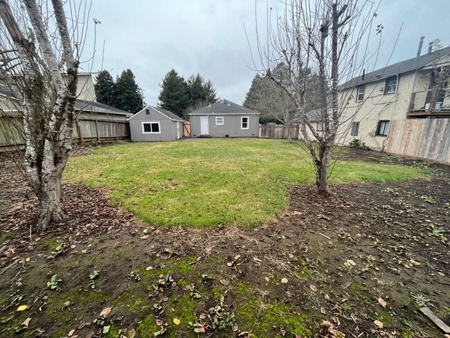 Building Photo - Wow! What a yard! 2/1 house with garage in excellent location