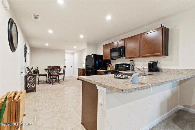 Foto del edificio - 5893 Creekside Crossing Dr