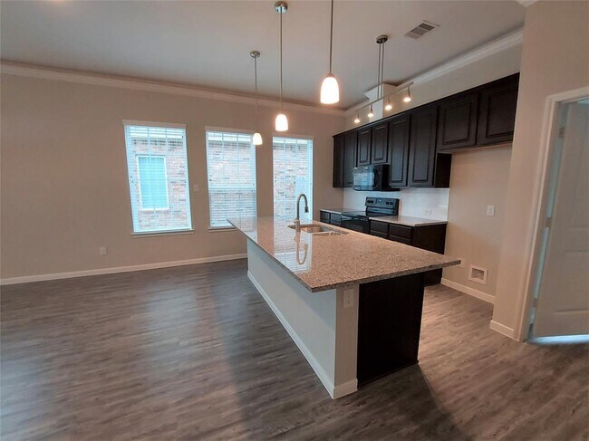 Foto del edificio - 6504 Turner Fields Ln