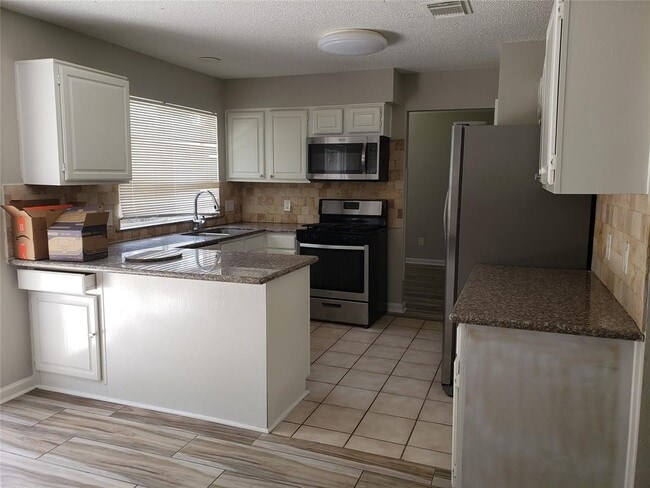 Building Photo - 4910 Cotter Lake Dr
