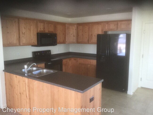 Building Photo - 3 br, 2.5 bath House - 6620 Wilderness Tr.