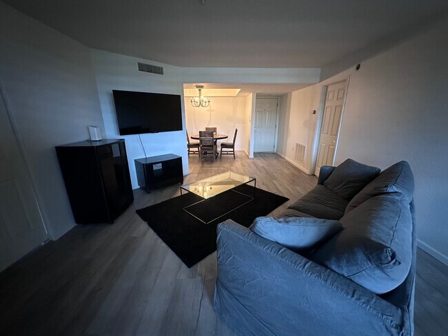 Living room view view from balcony sliding door (fully furnished) - 4200 N Miller Rd