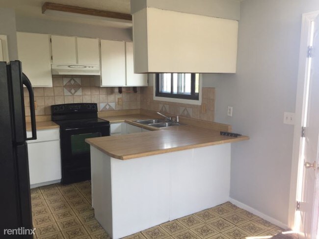 Building Photo - 5 br, 2 bath House - 733 S. Elm Ave.