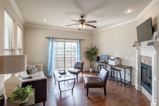 4BR, 3BA - 1,974 SF - Living Room - The Row at Arkansas