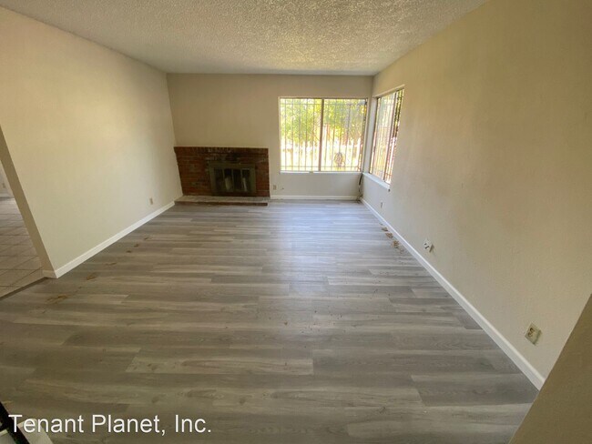 Building Photo - 4 br, 2.5 bath House - 2009 S White Rd.