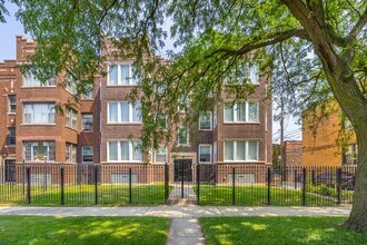 Building Photo - 7443 S Paxton Ave