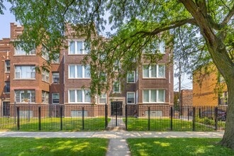Building Photo - 7443 S Paxton Ave
