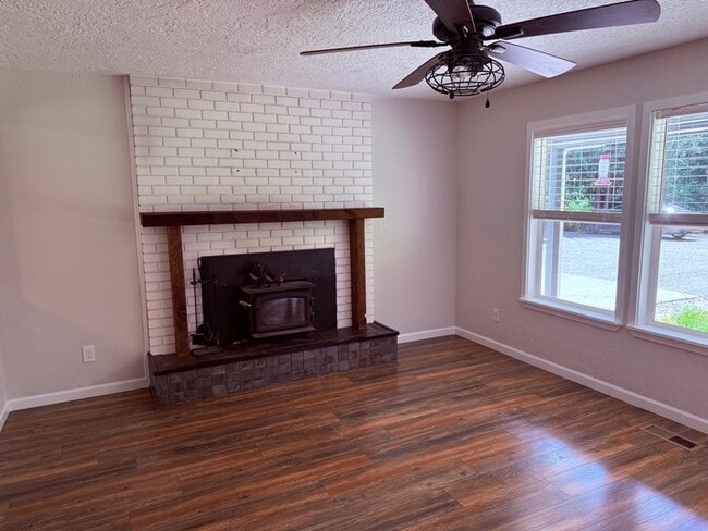 Building Photo - BEAUTIFUL UPDATED RAMBLER WITH LARGE GARGE