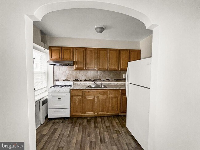 Building Photo - 5971 Woodcrest Ave