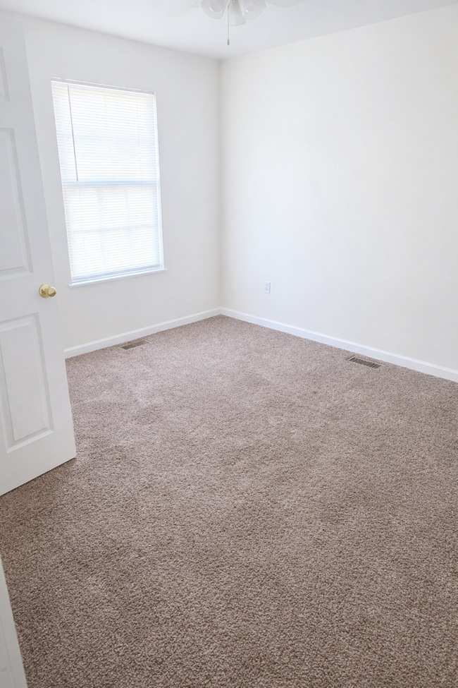 Building Photo - Spacious 2 Bed Downstairs Unit – W/D Hookups, Stove, Refrigerator, Water & Trash Included