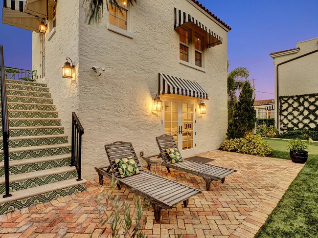 Exterior with Well-Lit Driveway access - 1616 N Swinton Ave
