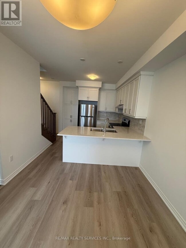 Photo du bâtiment - 75 Vinewood Cres