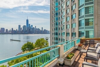 Our roof deck features plenty of space to lounge or meet with friends. - Newport Rentals