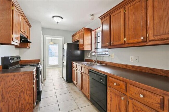 Building Photo - Updated kitchen with yard and patio, 2 car...