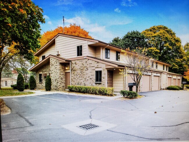 Outside of unit and garage entrance - 401 Cheviot Chase