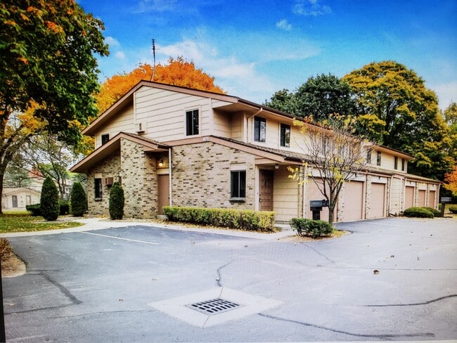 Outside of unit and garage entrance - 401 Cheviot Chase