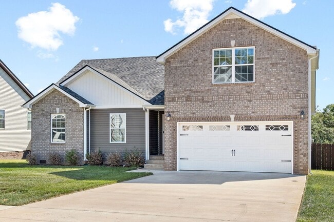 Building Photo - Pet Friendly Three Bedroom with Bonus!