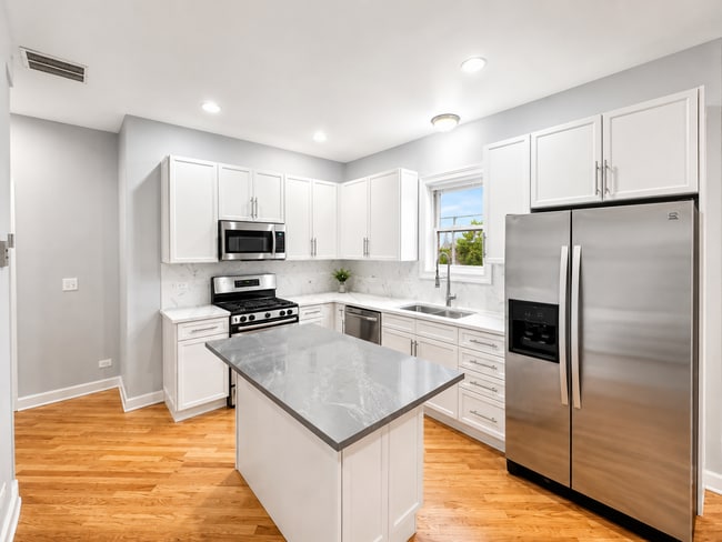 Updated and bright new kitchen with quartz countertops - 3513 North Reta Avenue