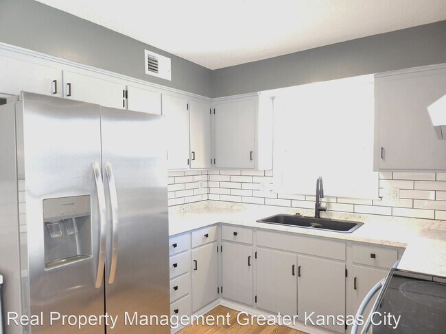 Building Photo - 4 br, 3 bath House - 1900 E. Sheridan Brid...