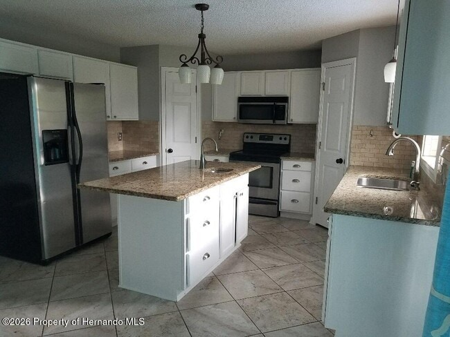 Building Photo - 6289 Freeport Dr