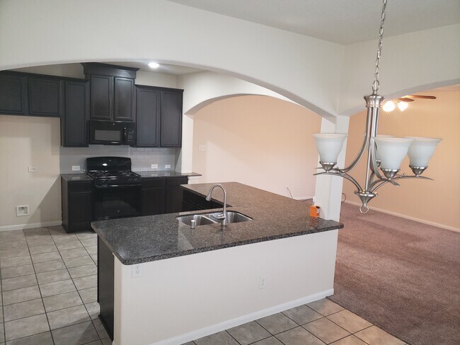 Cocina moderna - 14903 Orchid Meadow Dr