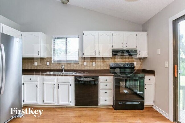 Building Photo - 6976 Finchley Dr