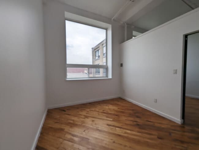 Building Photo - Huge 1-plus-den at Tiger Lofts