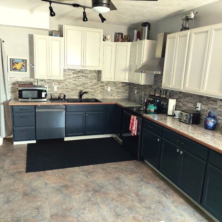 large kitchen includes appliances, dishes, silverware, pots n pans and more - 33 S Main St
