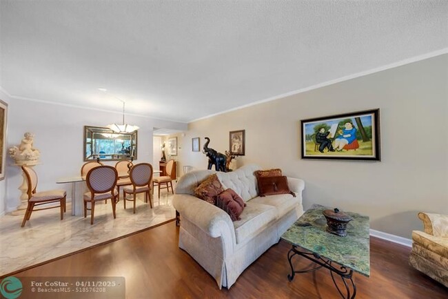 Building Photo - 3150 N Palm Aire Dr
