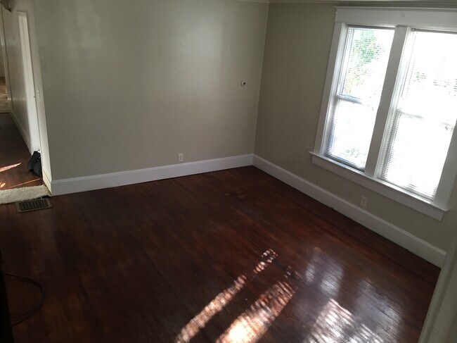 This is the family room as viewed from the front door. - 1542 South Center Street