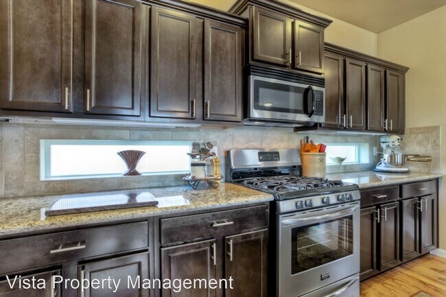 Building Photo - 4 br, 2.5 bath House - 9201 159th St Ct E