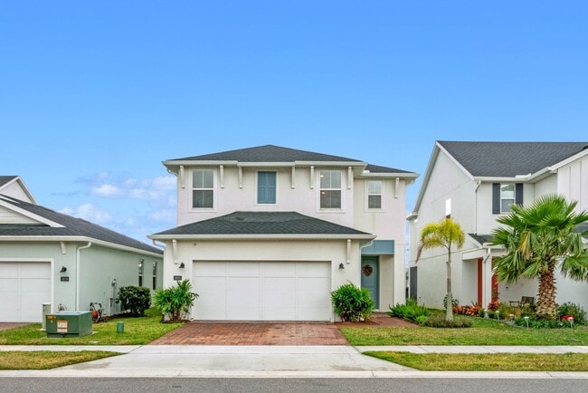 Building Photo - Water Front Home- 4 Large Bedrooms-3 baths Gated Community Call Sheila Campbell 407-687-7900