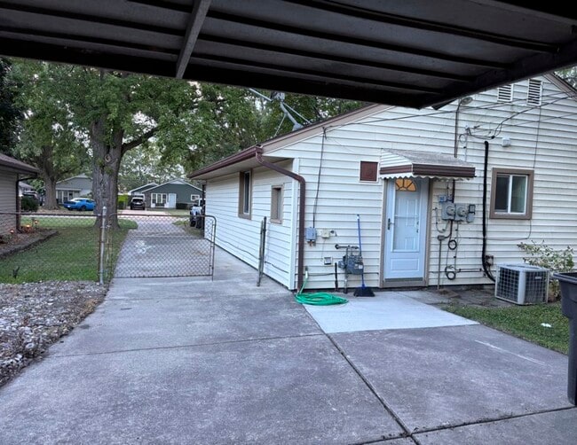 Back of house from garage - 8095 Monroe Blvd