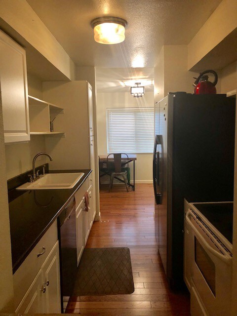 Kitchen and dining room - 1060 S Parker Rd