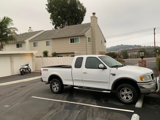 Rear of unit, my truck, motorcycle and garage - 859 Del Mar Downs Rd