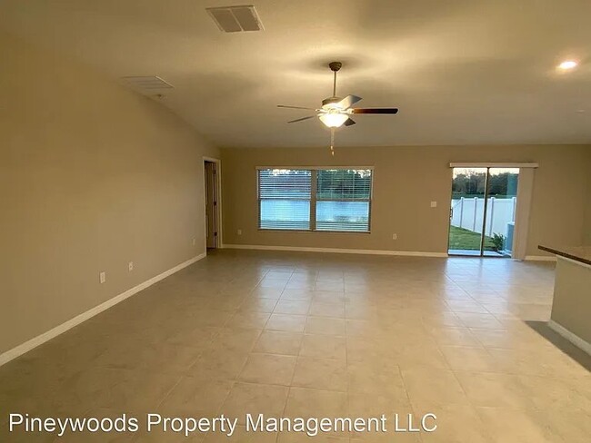 Building Photo - "Spacious 4-Bedroom Sanctuary with 2 Baths...